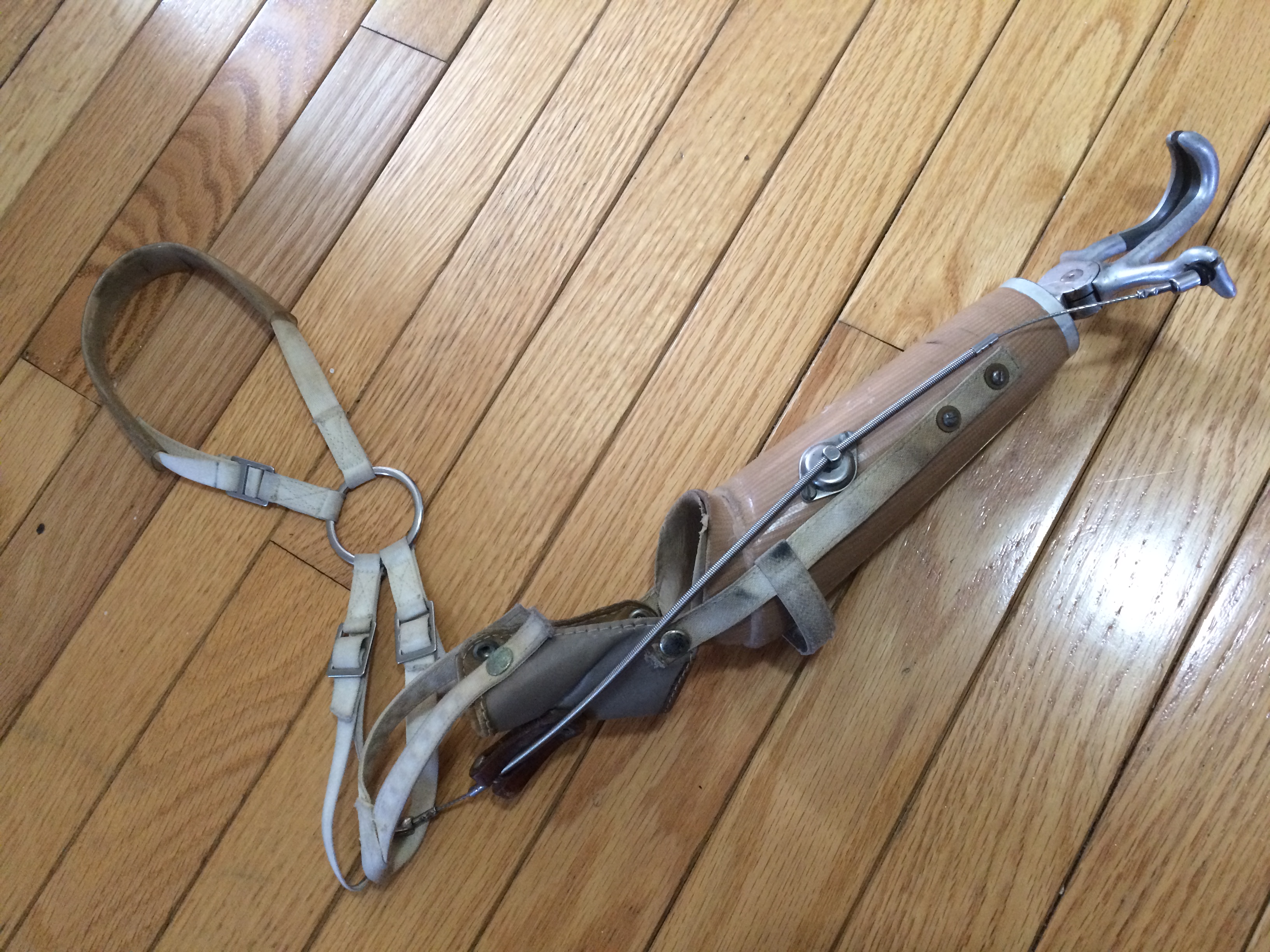 This was a child's prosthetic arm from the late 1800s to early 1900s.  I have slowly been fixing it up.  Originally the springs that kept the arm were