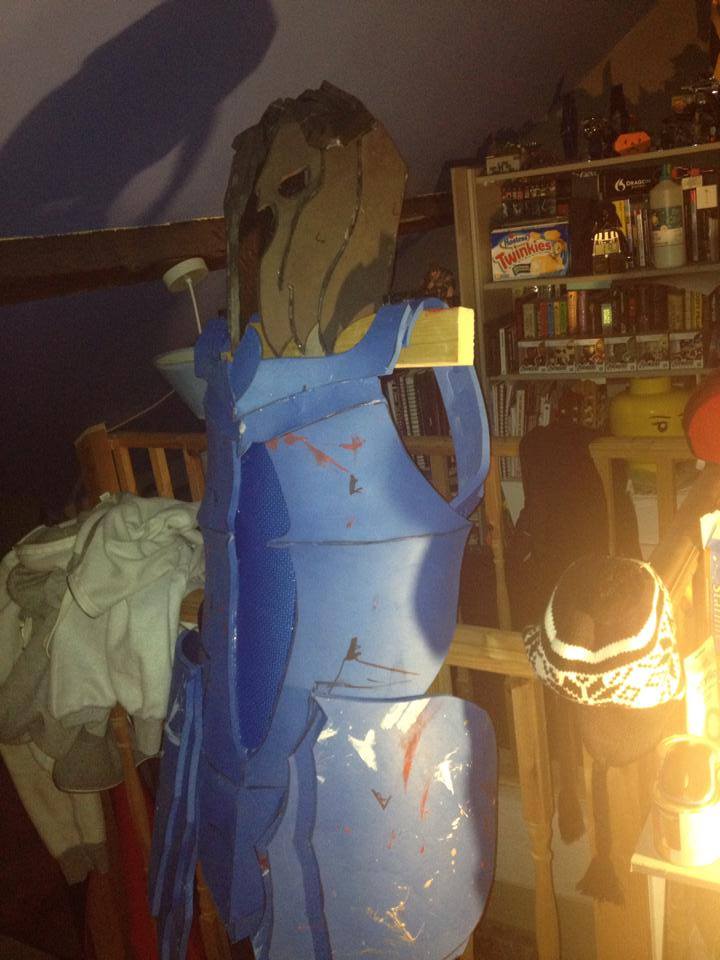 Unfinished helmet with torso.