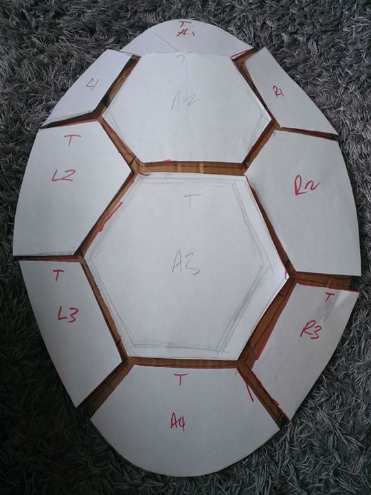 Using paper, work out the templates for the top layer segments, allowing a 10mm, gap between them and then transfer them onto card.