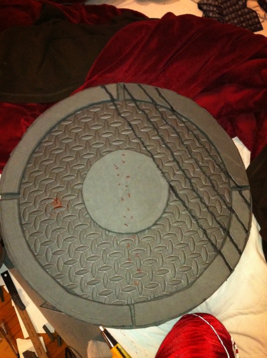 While making the armor and updating via Facebook, a friend asked me to commission him a shield that looks like a manhole cover based in the Fallout un