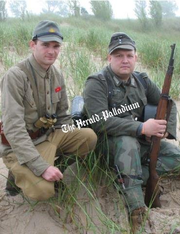With my buddy and reenacting mentor Rick at the D-Day landing 2009. He had switched kits for the Pacific landing staged after the D-Day landing.